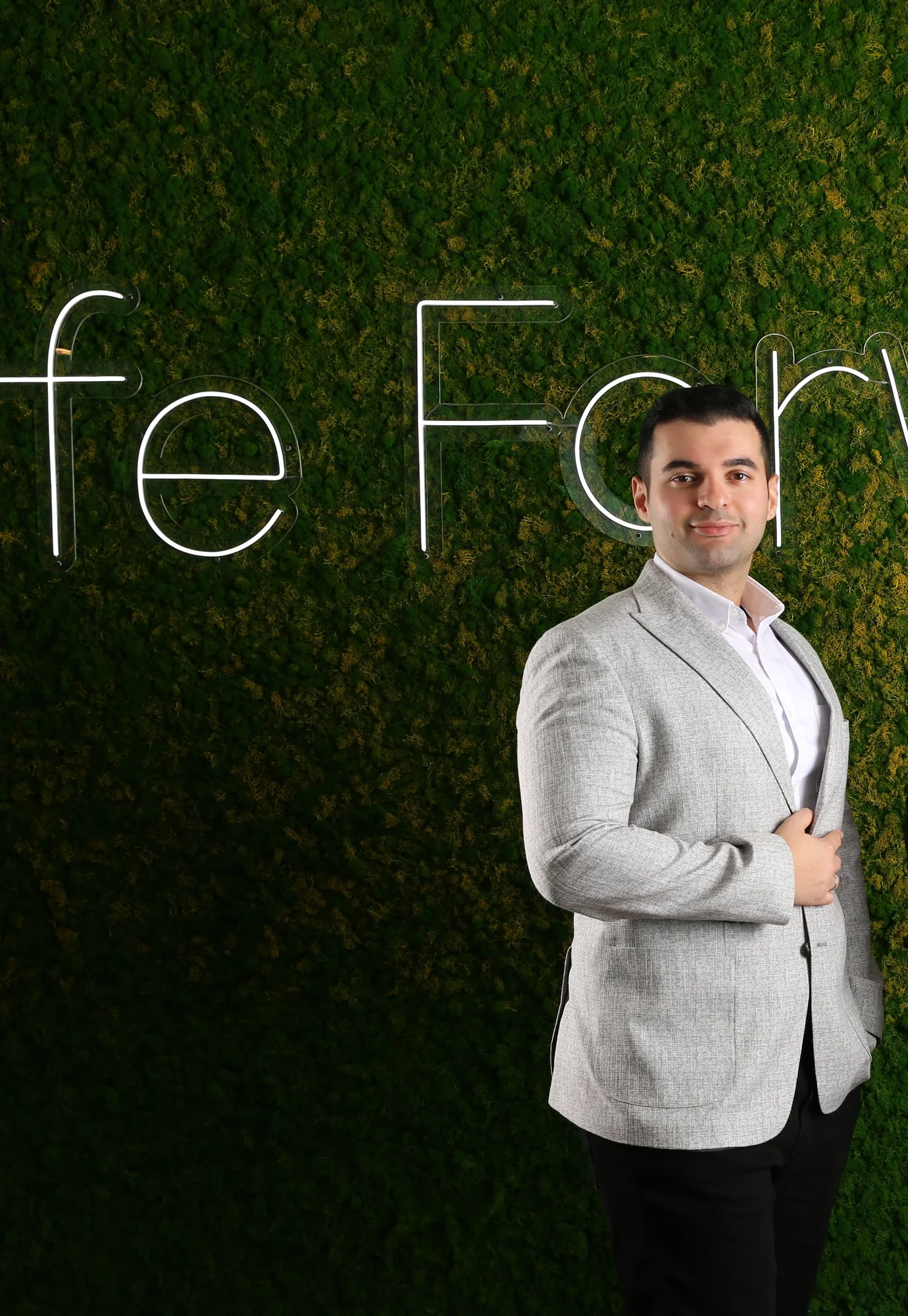Khalid Samara at a green living-wall installation